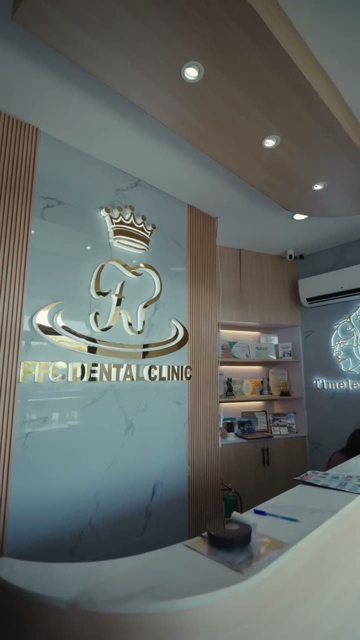 FFC Dental Clinic reception — warm, modern waiting area